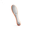 Grinding feet to remove dead skin and calluses