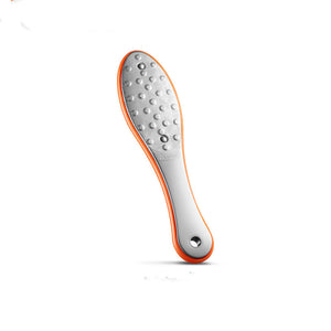 Grinding feet to remove dead skin and calluses