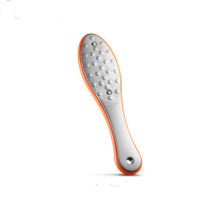 Grinding feet to remove dead skin and calluses
