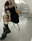 Pleated skirt with letter straps
