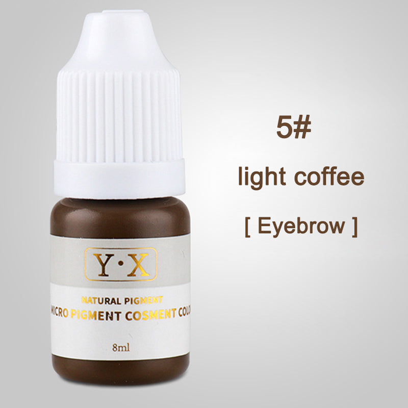 Small bottle of mist eyebrow eyebrow cream