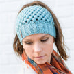 Europe and the United States new knit hat winter ladies horsetail hat autumn and winter earmuffs wool hat fashion labeling empty top hat