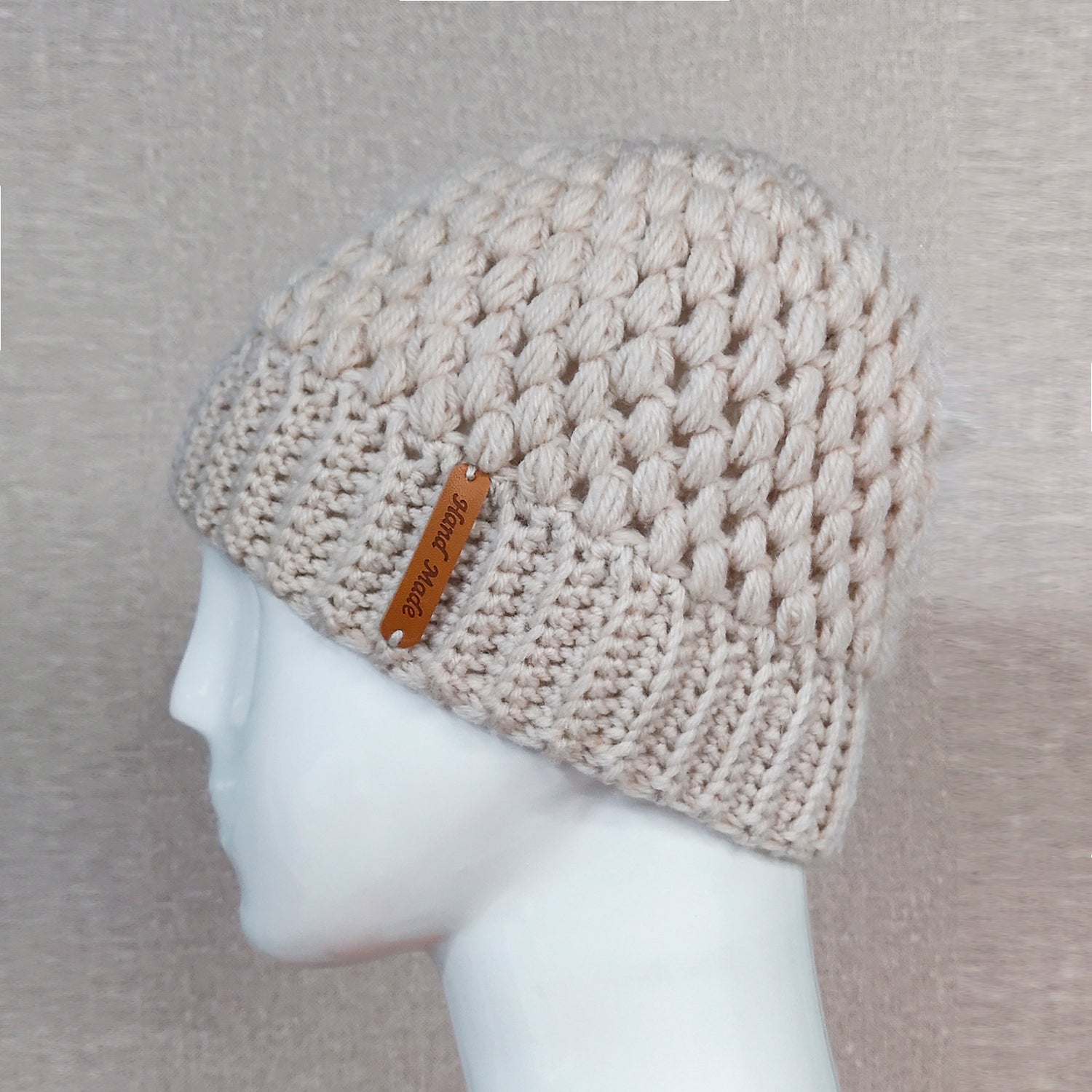 Europe and the United States new knit hat winter ladies horsetail hat autumn and winter earmuffs wool hat fashion labeling empty top hat