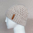 Europe and the United States new knit hat winter ladies horsetail hat autumn and winter earmuffs wool hat fashion labeling empty top hat