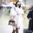 Long hooded fur coat
