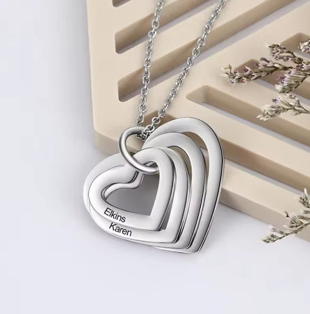 A Stainless Steel Heart-shaped Necklace Engraved With Family Personality And A Heart Shape