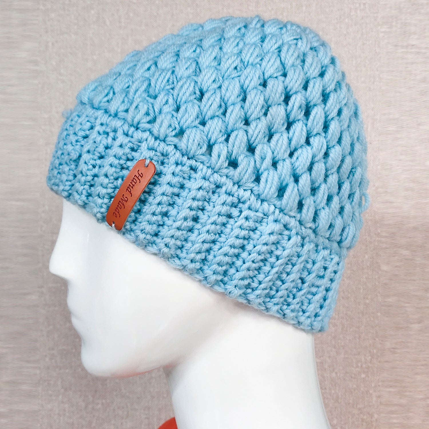 Europe and the United States new knit hat winter ladies horsetail hat autumn and winter earmuffs wool hat fashion labeling empty top hat