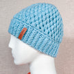 Europe and the United States new knit hat winter ladies horsetail hat autumn and winter earmuffs wool hat fashion labeling empty top hat