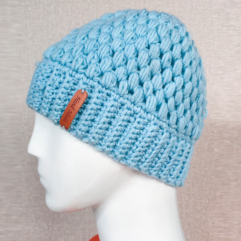 Europe and the United States new knit hat winter ladies horsetail hat autumn and winter earmuffs wool hat fashion labeling empty top hat