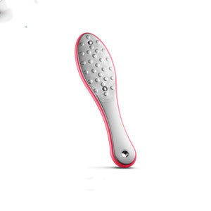 Grinding feet to remove dead skin and calluses