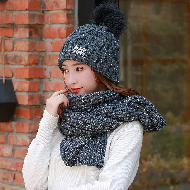 Women knitting wool hat and long scarf