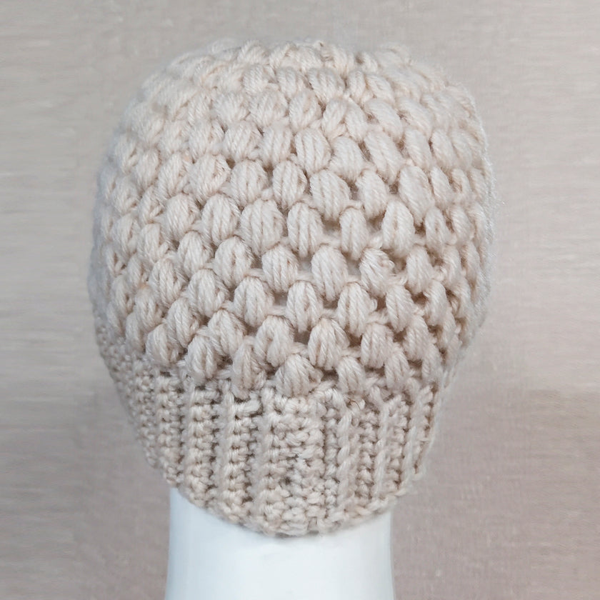 Europe and the United States new knit hat winter ladies horsetail hat autumn and winter earmuffs wool hat fashion labeling empty top hat