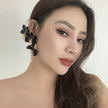 Long Rhinestone-encrusted Chain Flower Ear Clip