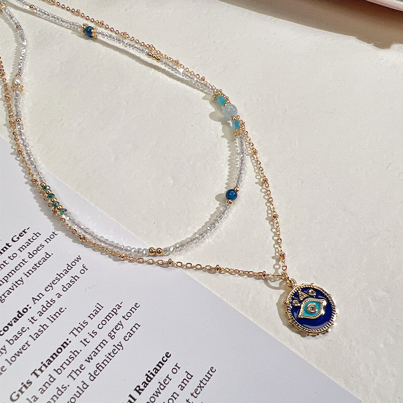 Two Stacked Necklaces With Natural Crystals