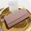Women's hand holding wallet female long section 2021 new Japanese and Korean personality pendant multi-function student wallet
