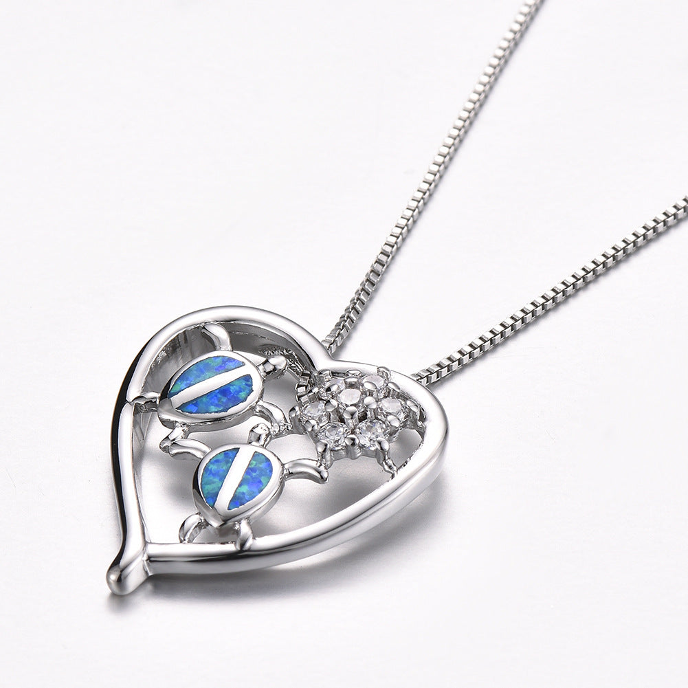 White gold tortoise necklace pendant