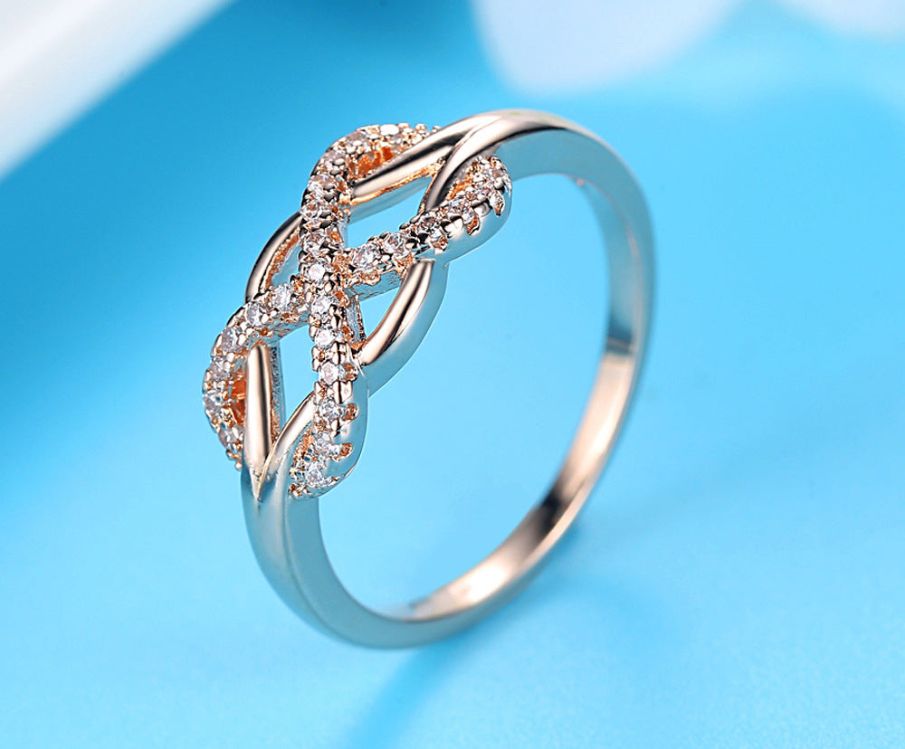 Number 8 twisted micro inlaid zircon ring