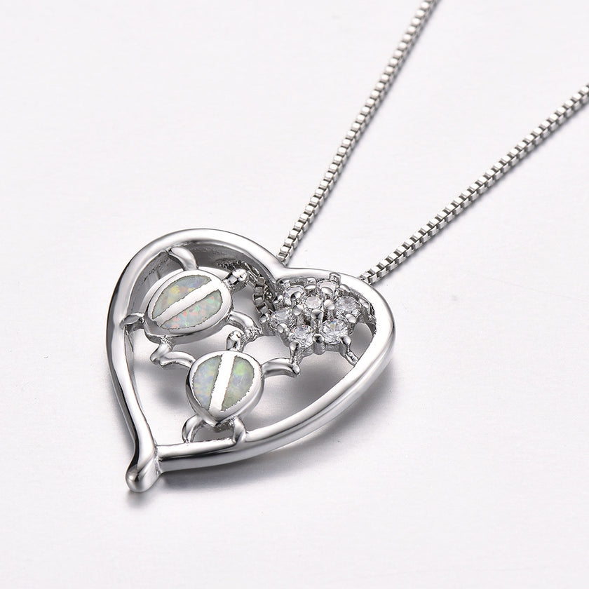 White gold tortoise necklace pendant