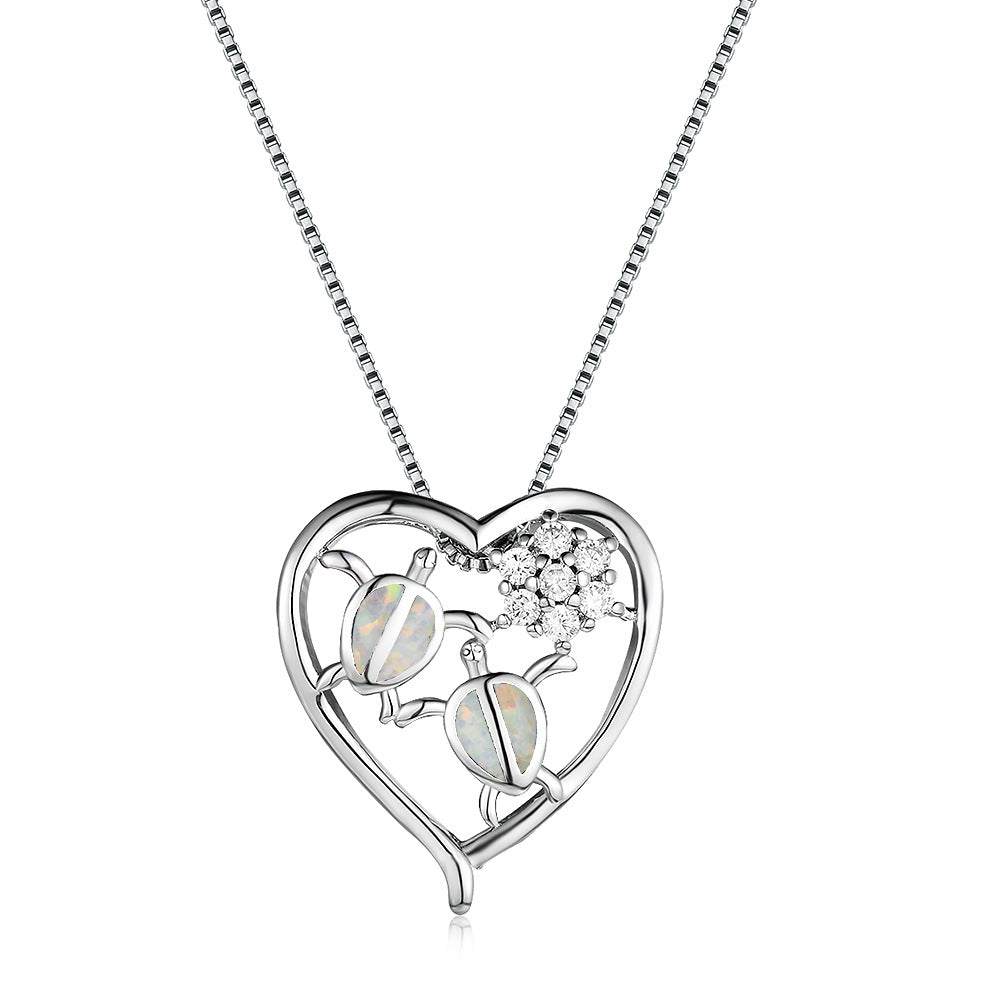 White gold tortoise necklace pendant