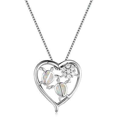 White gold tortoise necklace pendant