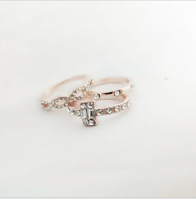 Square set with diamond studded zircon ring
