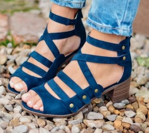 Oversized stud sandals