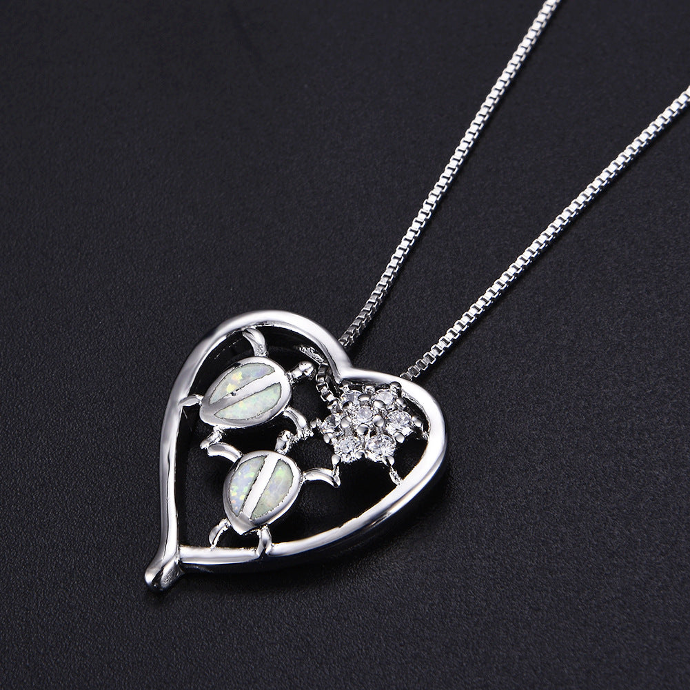 White gold tortoise necklace pendant