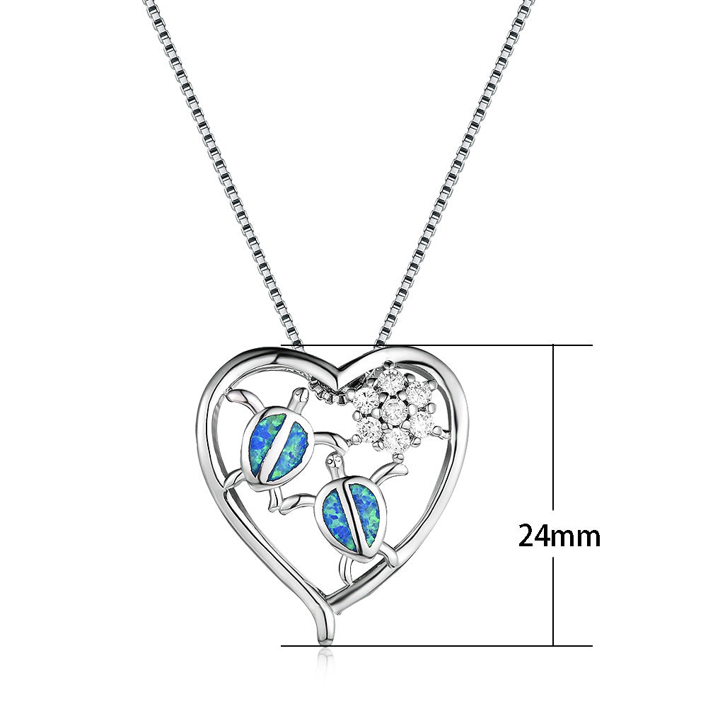 White gold tortoise necklace pendant