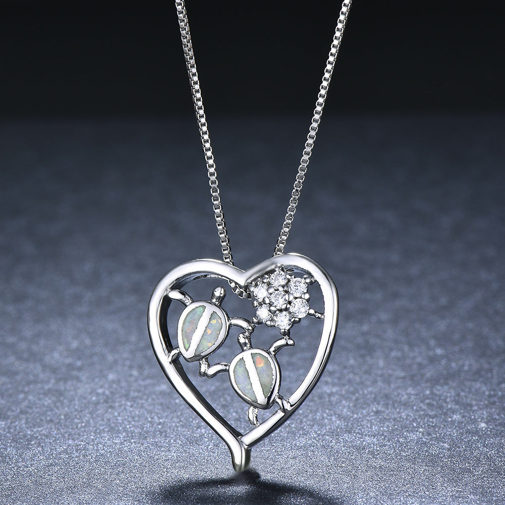 White gold tortoise necklace pendant