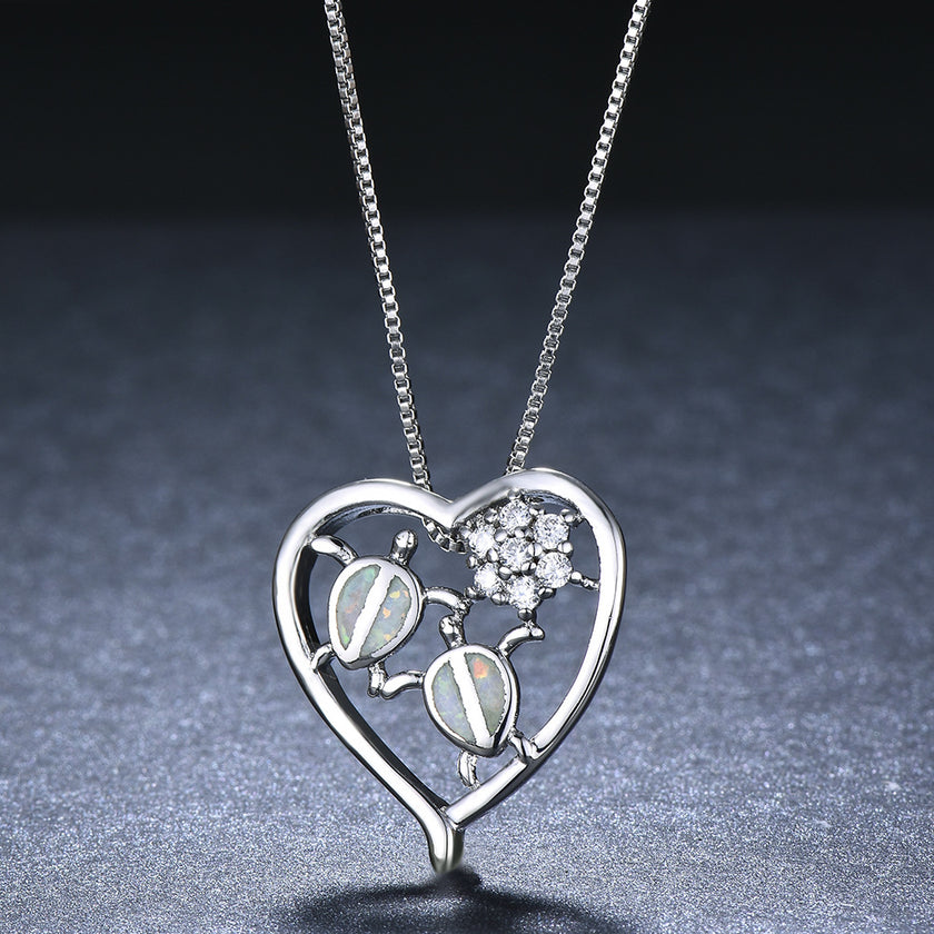 White gold tortoise necklace pendant