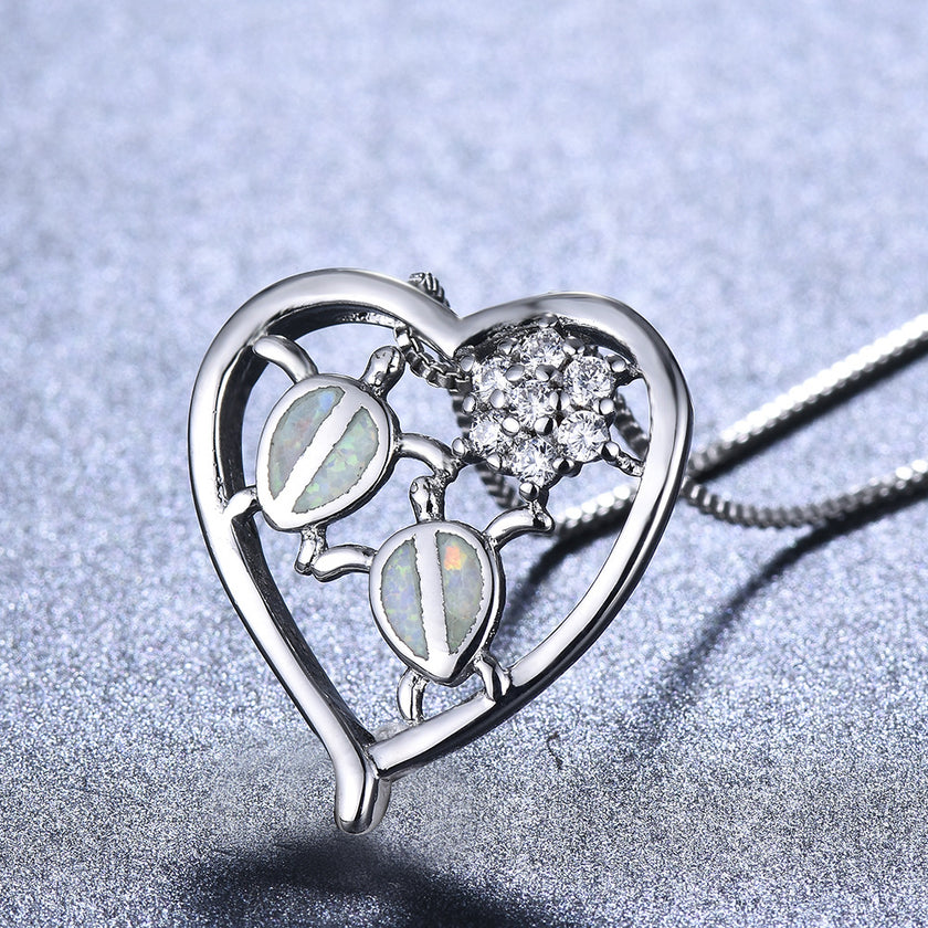 White gold tortoise necklace pendant