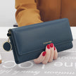Women's hand holding wallet female long section 2021 new Japanese and Korean personality pendant multi-function student wallet