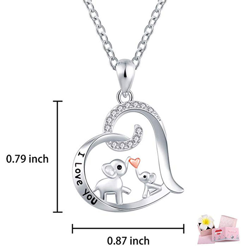 Baby elephant kisses the necklace